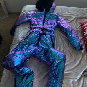 Iridescent snow suit.